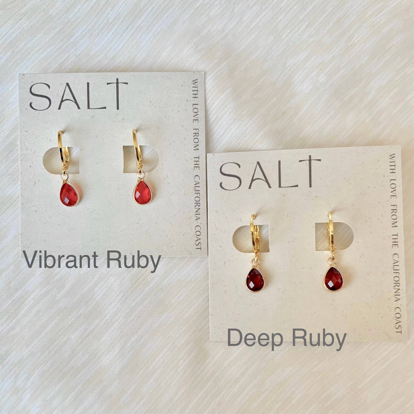 RUBY RED HUGGIE HOOPS | gold