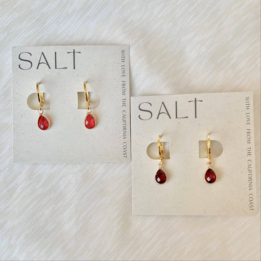 RUBY RED HUGGIE HOOPS | gold
