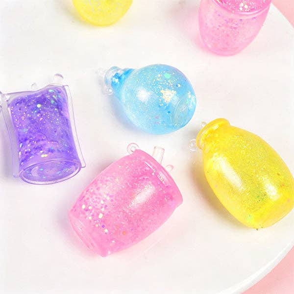 SugarSqueez Squishies® Glitter Bottle Maltose Fidget Stress Ball (1pc) Assorted Colors