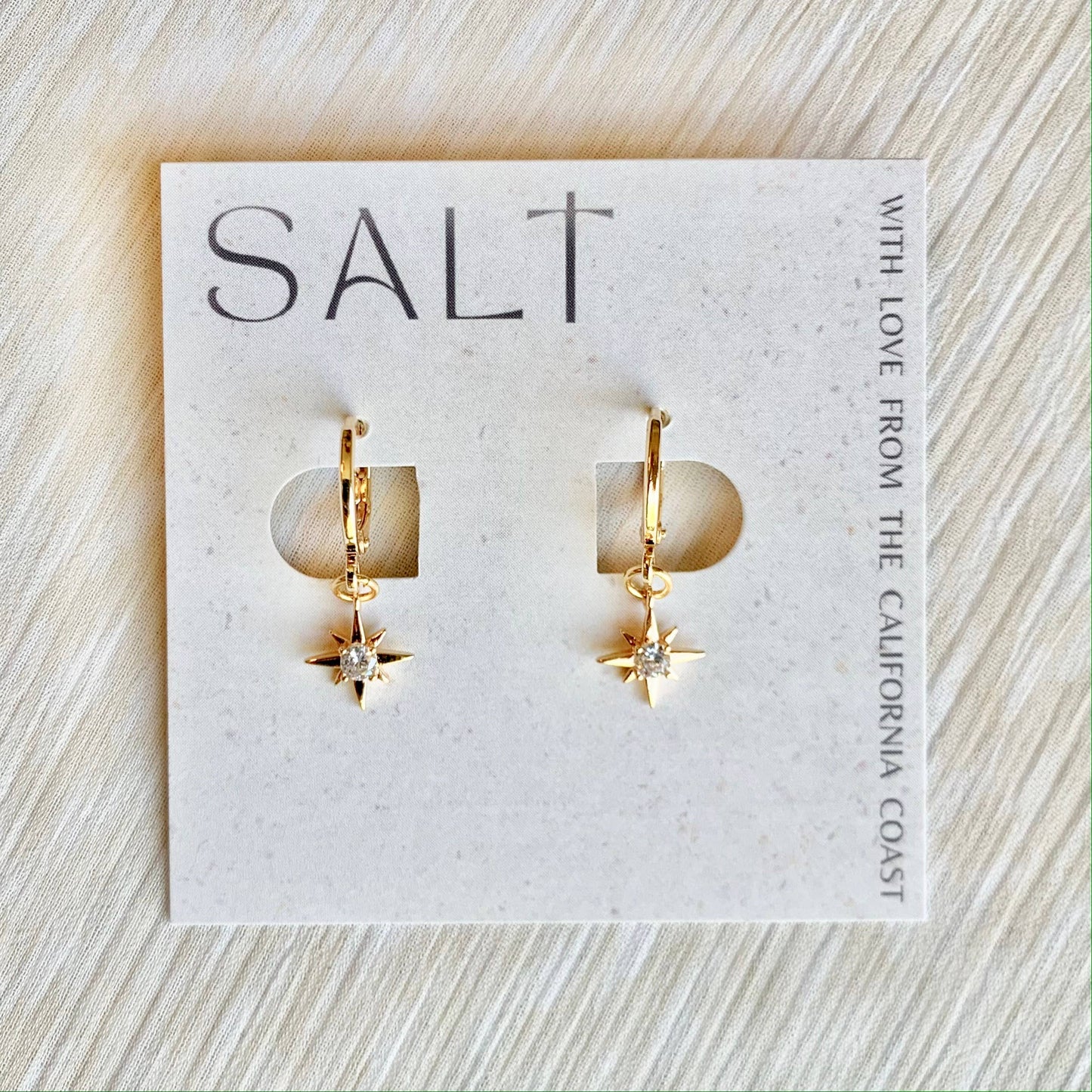 STARBURST HUGGIE HOOPS | gold | star charm earrings