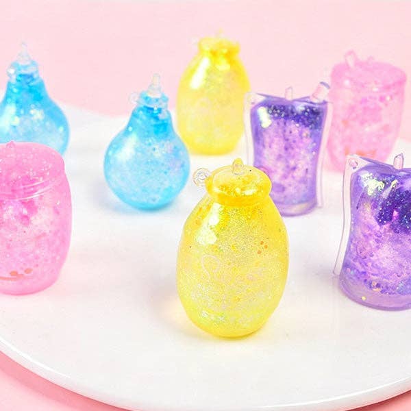 SugarSqueez Squishies® Glitter Bottle Maltose Fidget Stress Ball (1pc) Assorted Colors
