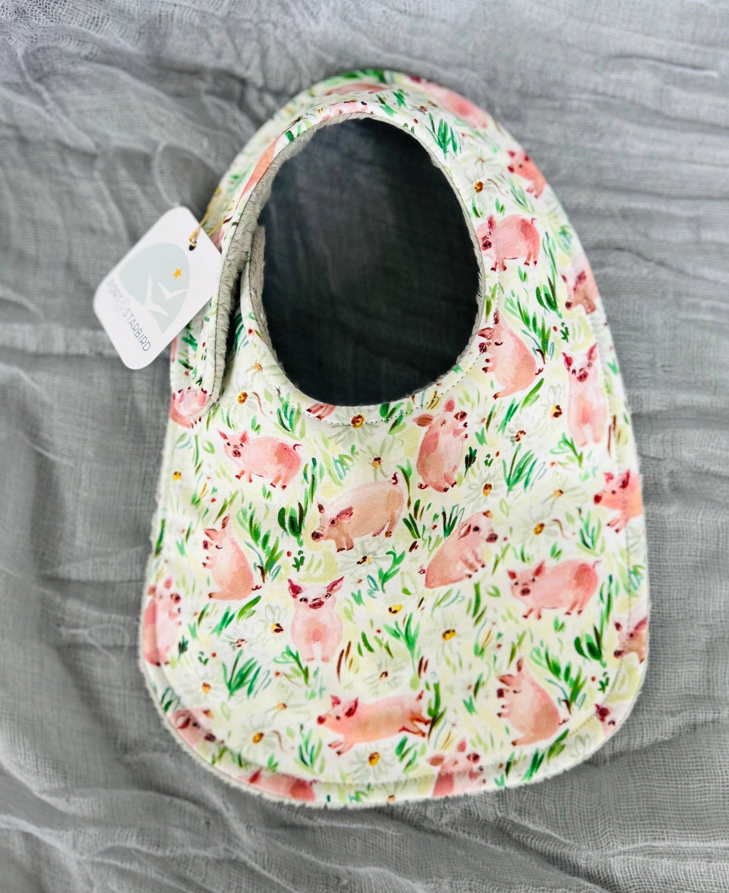 Pigs in the Field bib