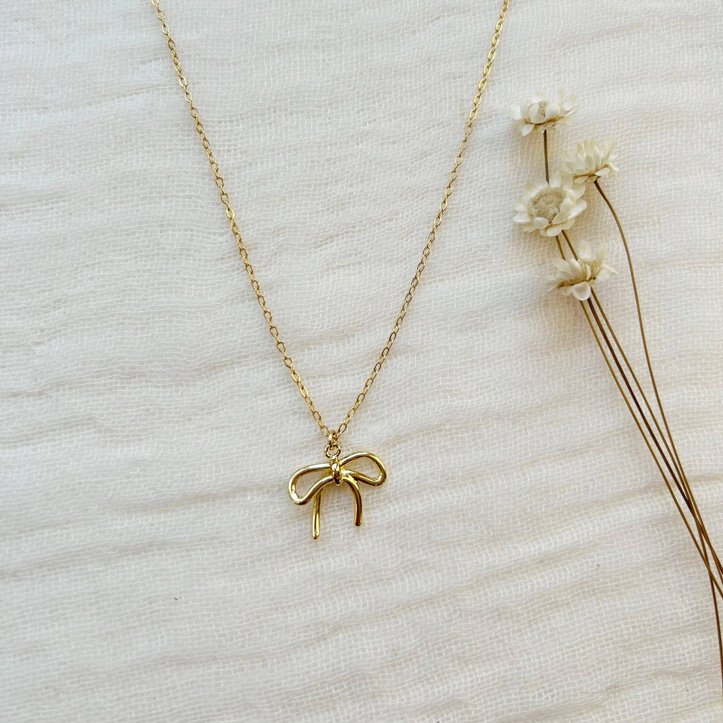 Gold Bow Charm Necklace
