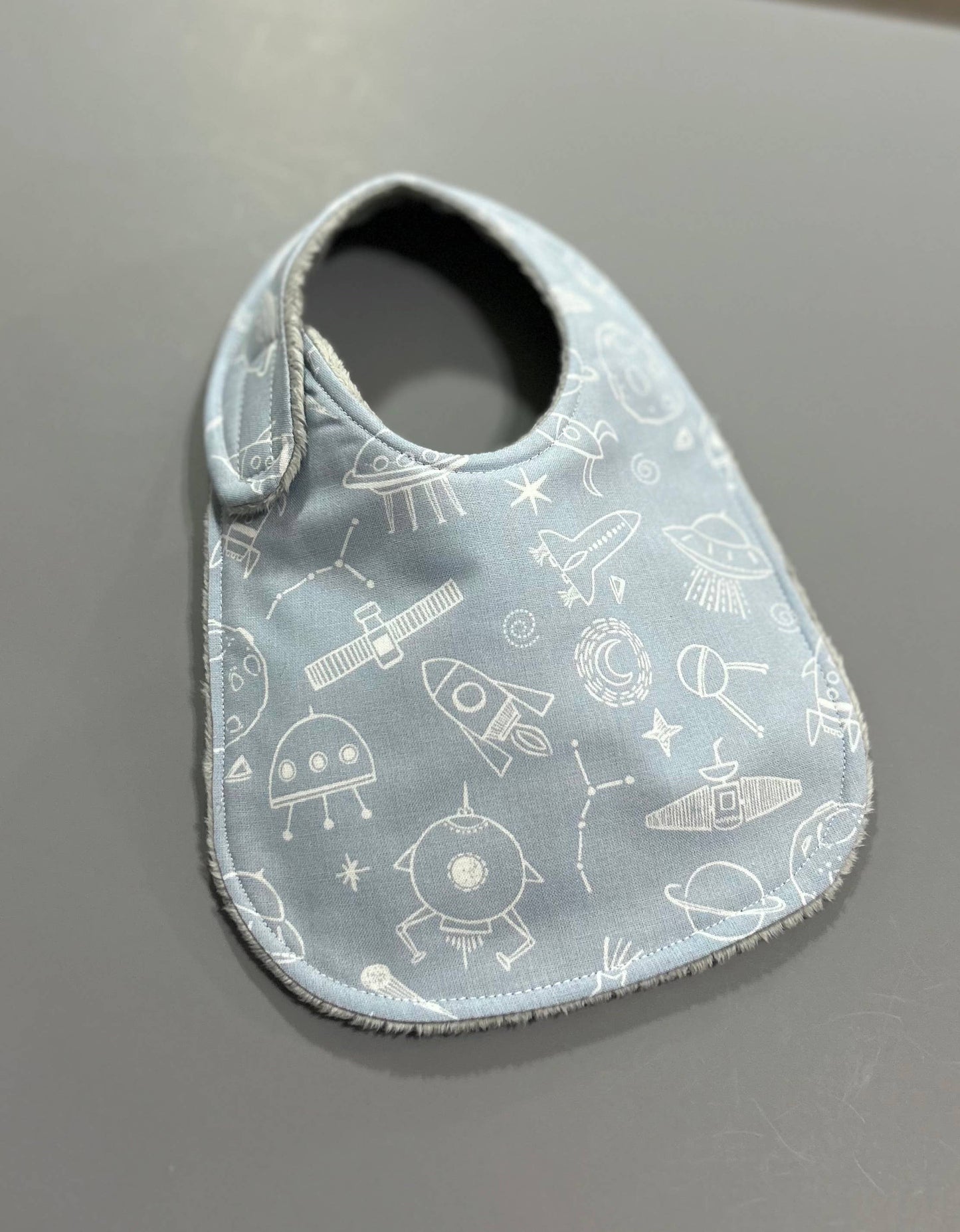 Outer Space on Blue bib